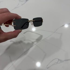 Cartier Black and Gold Rimless Glasses